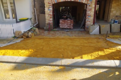 New layer of yellow sand ready for the driveway